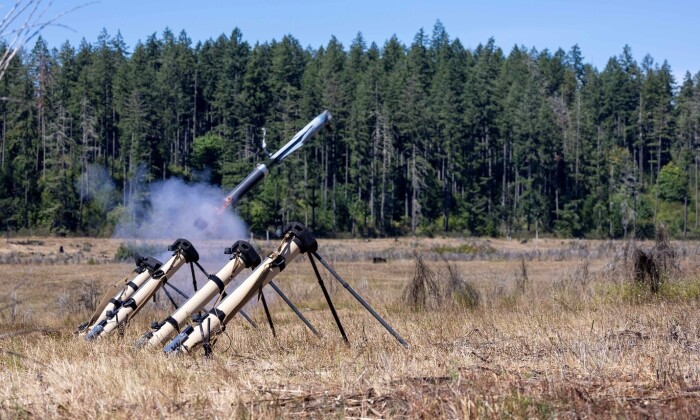 U.S. Army Soldiers set up and employ the Anduril Altius 600 Launched Effects in support of a Launched Effects Short-Range Special User Demonstration at Joint Base Lewis-McChord, Washington. (U.S. Army Photo by Sgt. Brandon Bruer)